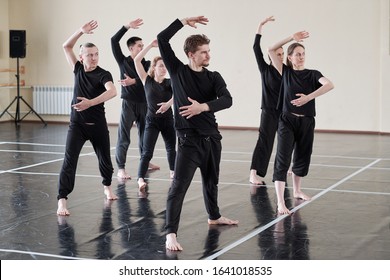 Group Of Male And Female Dancers Learning New Dance In Rehearsal Studio, Horizontal Shot