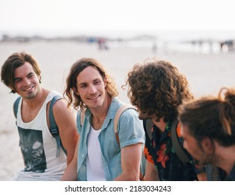 Group Of Male Friends On Beach Enjoying Summer Holiday Students Having Fun On Vacation Attractive Guys Hanging Out On Beachfront At Sunset