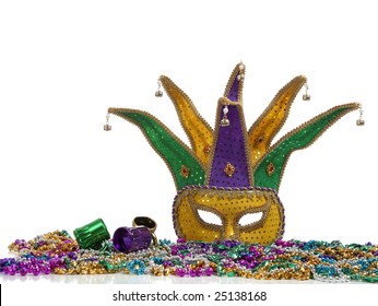 A Group Of Mardi Gras Beads An Mask With Copy Space