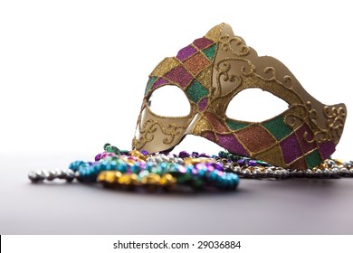 A Group Of Mardi Gras Beads An Mask With Copy Space