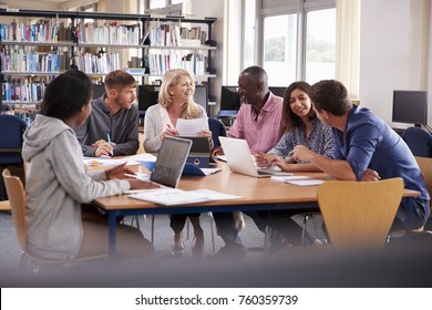 Group Of Mature College Students Collaborating On Project - Powered by Shutterstock