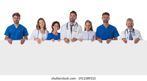 Group of medical doctors holding blank banner ad isolated on white background