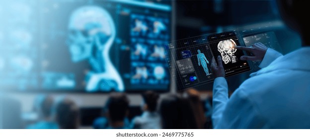 A group of medical professionals reviewing and analyzing detailed brain scans displayed on digital screens and tablets, highlighting advanced  AI medical imaging technology. - Powered by Shutterstock