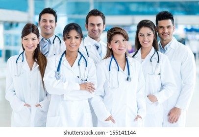 Group Of Medical Staff Smiling At The Hospital 