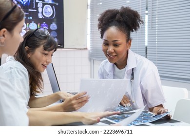 group of medical student study in class room. medical students studying human brain disease diagnosis through learning from X-ray film. Learn about brain surgery for diagnosis. - Powered by Shutterstock