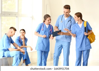 Group of medical students in hall of clinic