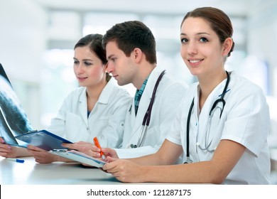 Group Of Medical Students Studying In Classroom