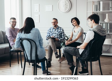 Group Meeting With Counselor For People Trying To Gain Life Balance