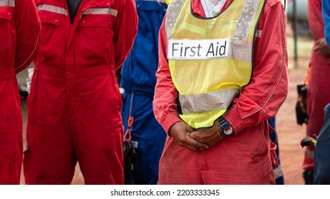 Group Meeting Of Field Operation Staffs With A Man Who Wear 