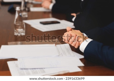 Group of men in business suits talking and discussing at conference, politicians and entrepreneurs debate, networking and negotiate, businessmen have dialog conversation on a forum, panel discussion