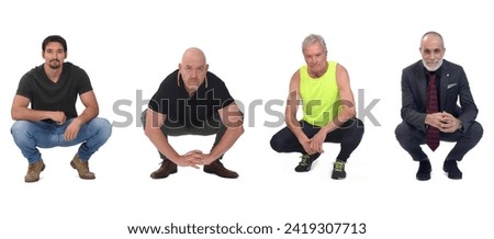 group of men crouching on  white background