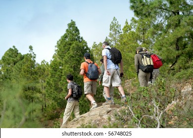 Group Of Men And Women Hiking