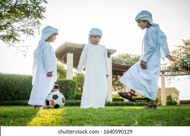 Group of middle-eastern kids playing and having fun outdoors