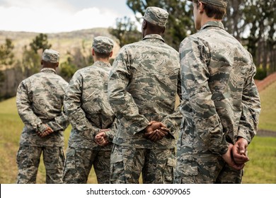 Group of military soldiers standing in line at boot camp - Shutterstock ID 630909065