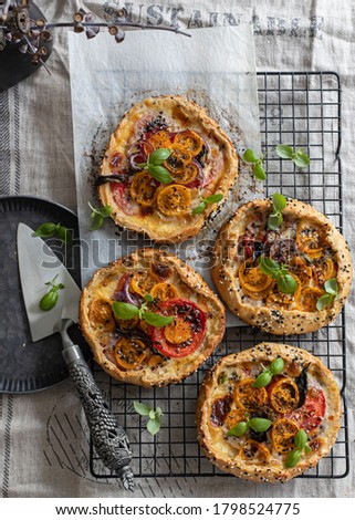 Similar – Puff pastry biscuits with nectarines, camembert and thyme