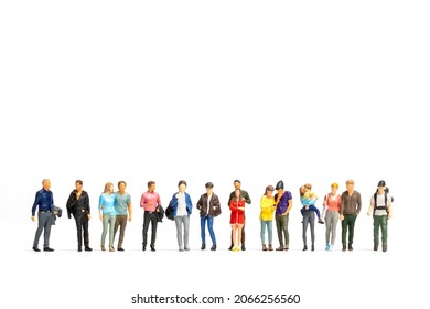 Group of Miniature people isolated on white background and space for text