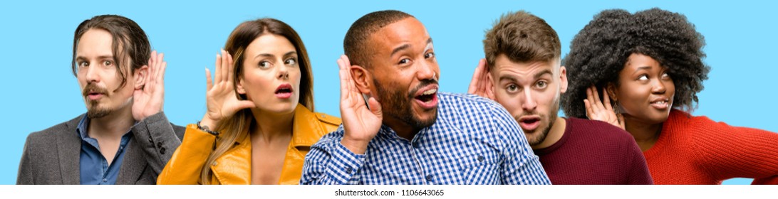 Group of mixed people, women and men holding hand near ear trying to listen to interesting news expressing communication concept and gossip