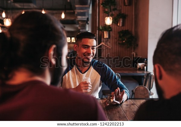 Group Mixed Race Young Men Talking Stock Photo (Edit Now) 1242202213