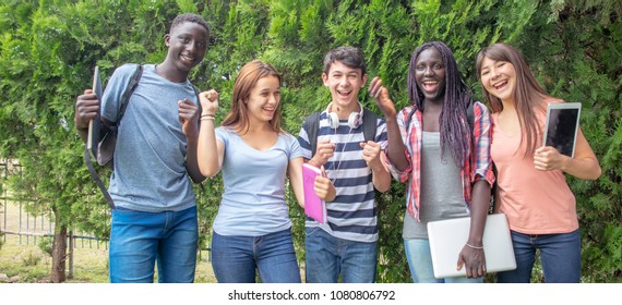 Group of mixed races teenagers happy smiling outdoor in the garden.