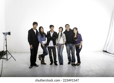 A Group Of Models In Photo Studio