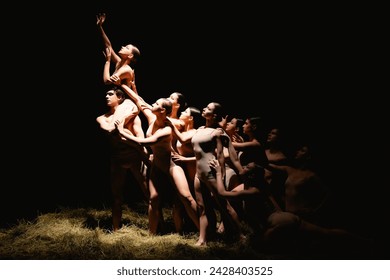 Group of modern ballet dancers. Contemporary art. Young flexible athletic men and women. - Powered by Shutterstock