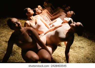 Group of modern ballet dancers. Contemporary art. Young flexible athletic men and women. - Powered by Shutterstock