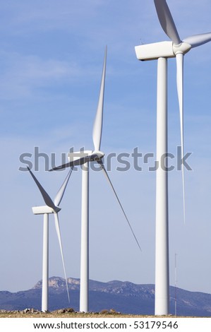 Similar – Foto Bild Windräder am Horizont unter dramatischem Himmel