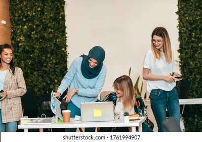 Group Of Modern Young Multi Cultural Business Women In Casual Wear Working In Modern Work Hub.