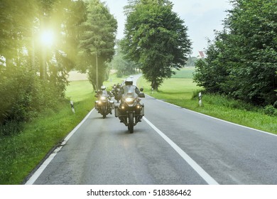 Group Of Motorcycle On Highway With Sunlight Flare