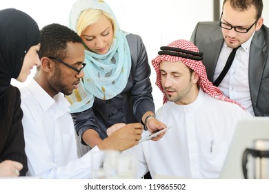 Group Of Multi Ethnic Business People At Work