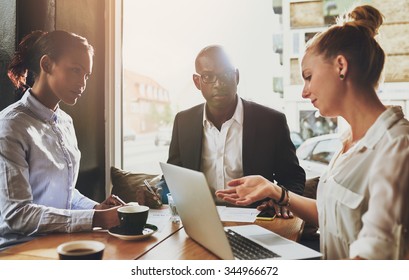 Group Of Multi Ethnic Business People At A Meeting, Small Business Entrepreneur Concept