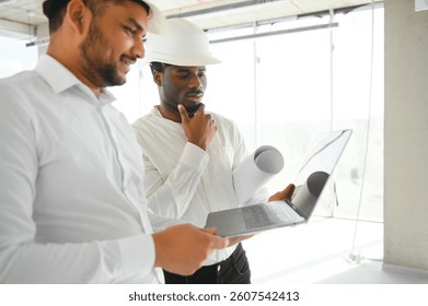 Group of multi ethnic engineer construction site worker meeting at workplace.