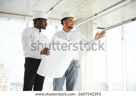 Group of multi ethnic engineer construction site worker meeting at workplace.