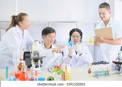 Group Multi Ethnic Scientists Laboratory Conducting Stock Photo ...