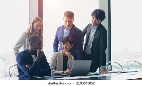 Group Of Multi Racial People Meeting In The Office. Global Business.