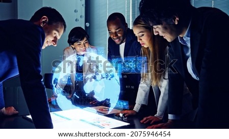 Group of multi racial people watching hologram display. Global business. Management strategy. Science technology. Sustainable development goals. SDGs.