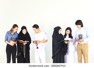 Group of multi religion in different traditional clothes include Christian, Islamic, Buddhism talking on white background. Variety of Religious Asian people knowledge exchange. Studio shot. - Shutterstock ID 2005847915