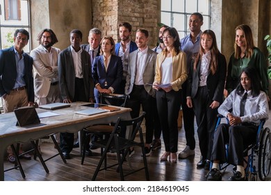 Group of multicultural business people from a coworking space standing together - Shutterstock ID 2184619045
