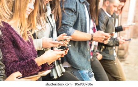 Group of multicultural friends using smartphone at university college backyard break - People hands addicted by mobile smart phone - Technology concept with always connected millennials - Filter image