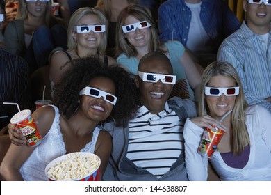 Group Of Multiethnic Audience Watching 3D Movie