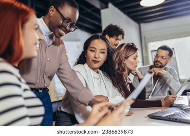 Group of multiethnic business people working together in the office - Powered by Shutterstock