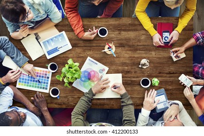 Group of Multiethnic Designers Brainstorming - Shutterstock ID 412200133