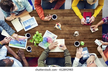 Group of Multiethnic Designers Brainstorming Concept - Shutterstock ID 412892983