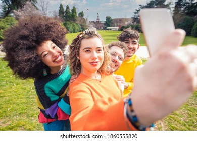 Group Of Multiethnic Diverse Friends Outdoor Taking Selfie  Having Fun Doing Live On Social Media Enjoying A Day In A Park Together