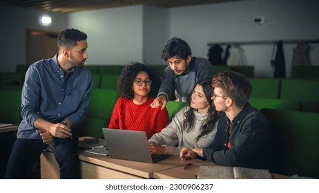 Group of Multiethnic Enthusiastic Students Comparing Research Findings in University Study Room. Young Doctorate Researcher Joining the Conversation with Colleagues - Powered by Shutterstock