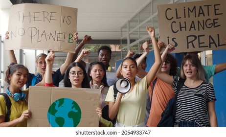 Group Of Multi-ethnic Teenagers Protesting Against Climate Change. No Planet B