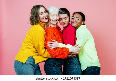 group of multiethnic women with different kind of skin posing together in studio. Concept about body positivity and self acceptance