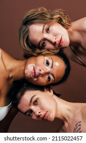 Group Of Multiethnic Women With Different Kind Of Skin Posing Together In Studio. Concept About Body Positivity And Self Acceptance