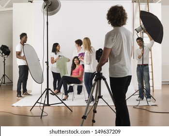 Group of multiethnic young people in studio during photo session