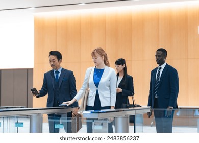 Group of multinational business people passing through a security gate - Powered by Shutterstock